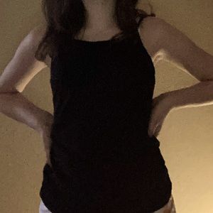 I am seeking a black tank top with spaghetti strap